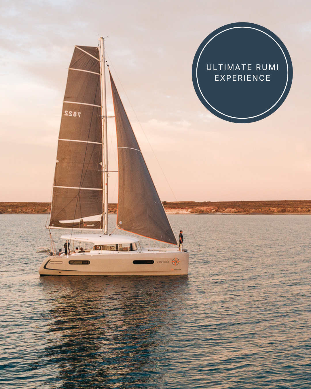 Luxury catamaran sailing at sunset near the shores of Louth Island as part of the Ultimate Rumi Experience